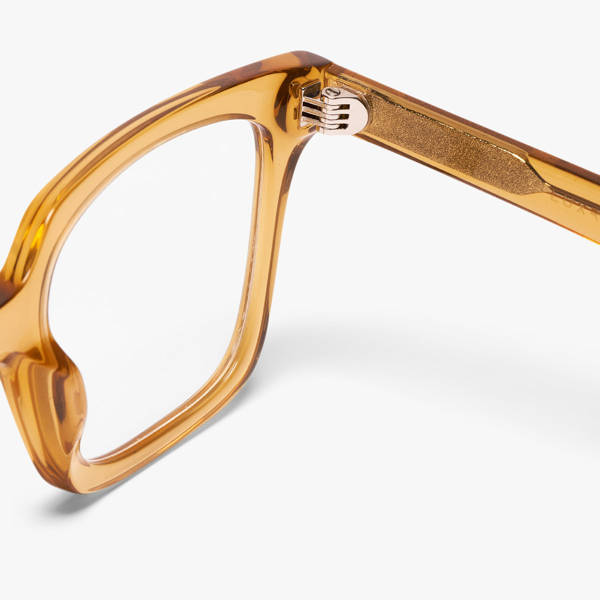 Luxreaders stylish Women's Tisvilde Crystal Caramel Reading glasses. Made from Bio-acetate in a Square shape.