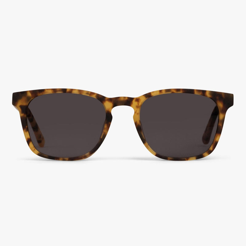 Tortoise shell sunglasses with dark lenses