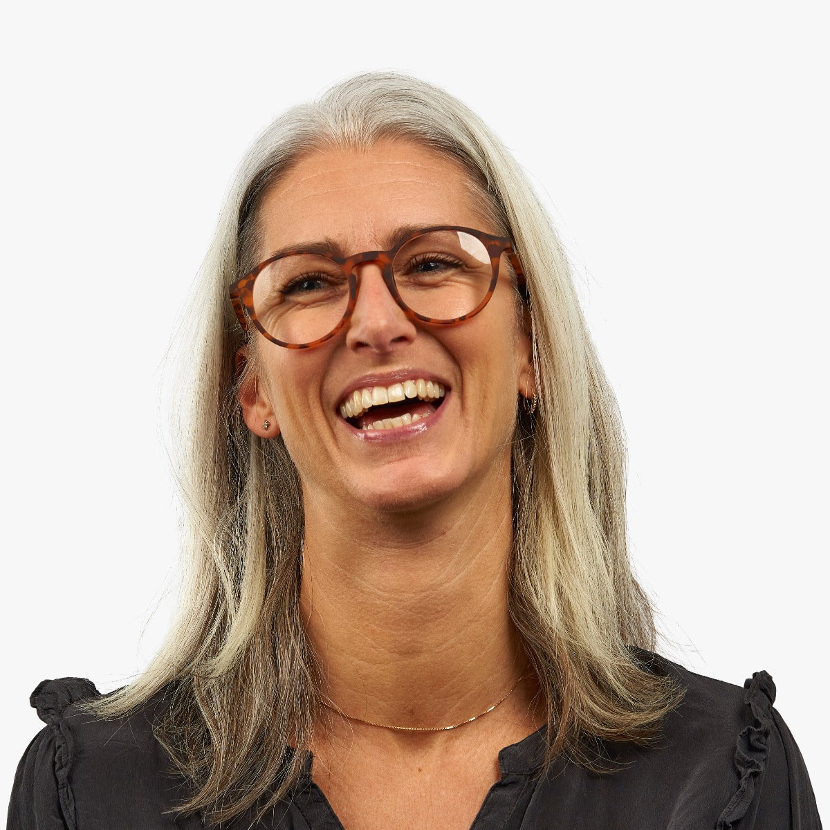 Person wearing Læsø Turtle tortoiseshell glasses