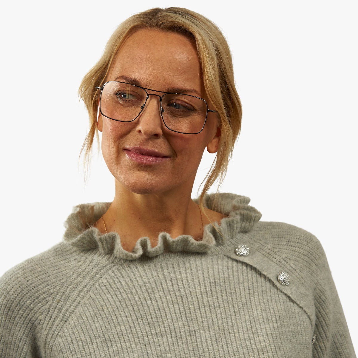 Person wearing Lidköping Black glasses with wireframe design
