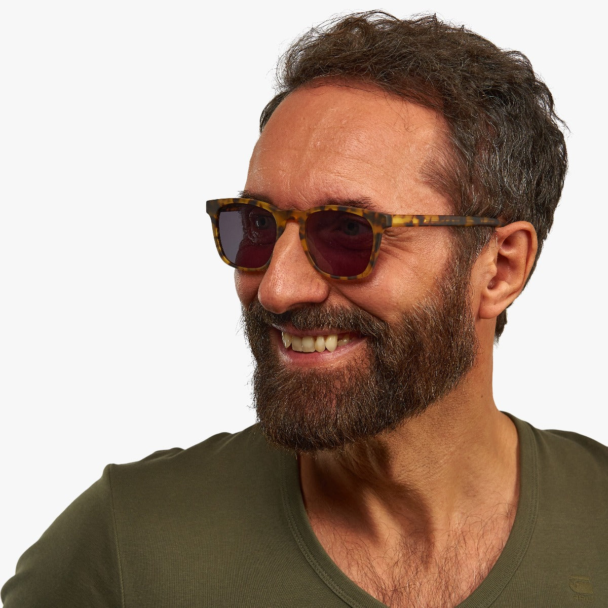Person wearing tortoiseshell sunglasses