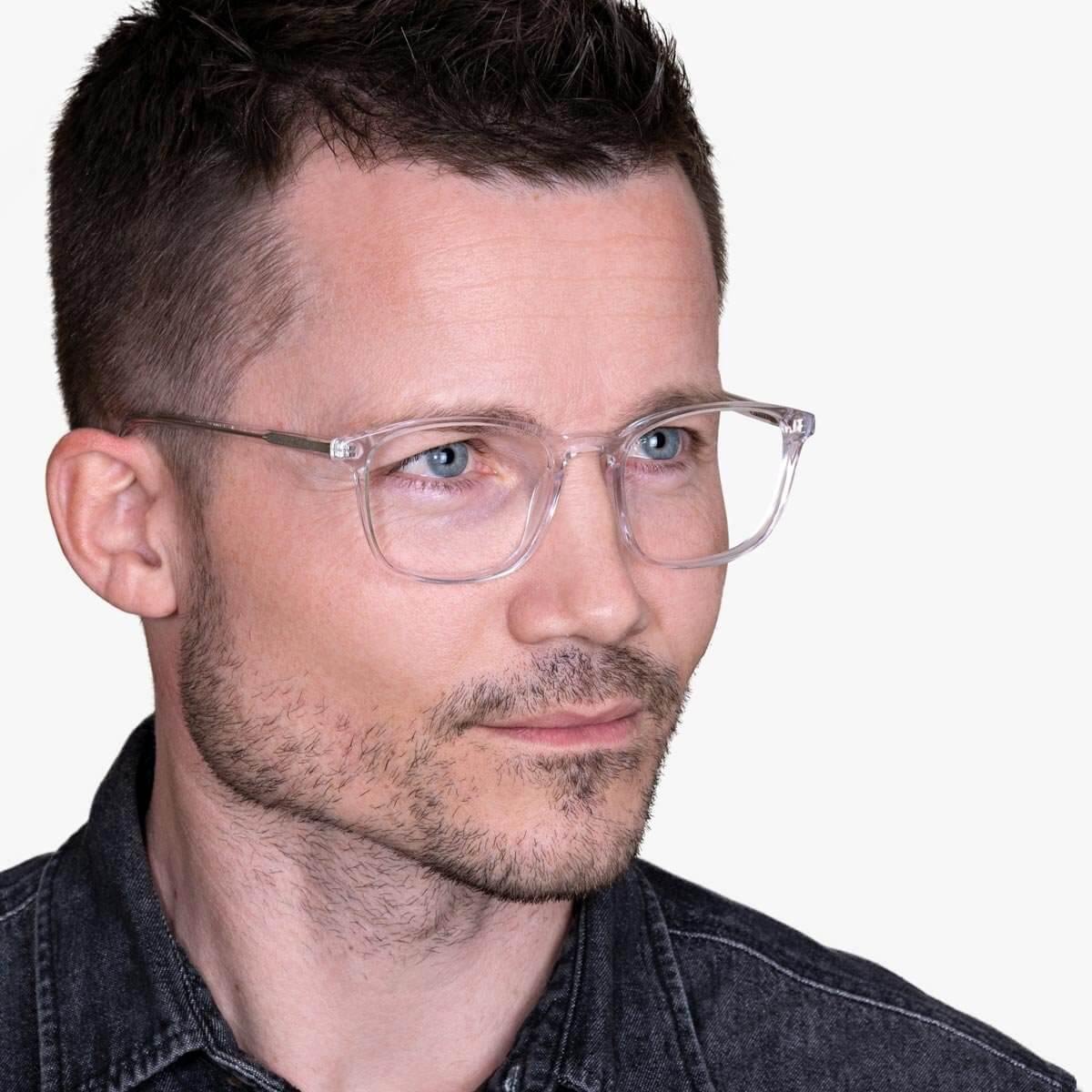 mens-ebeltoft-crystal-white_blue-light-glasses_male-model-1.jpg?v=1771423795&width=1200