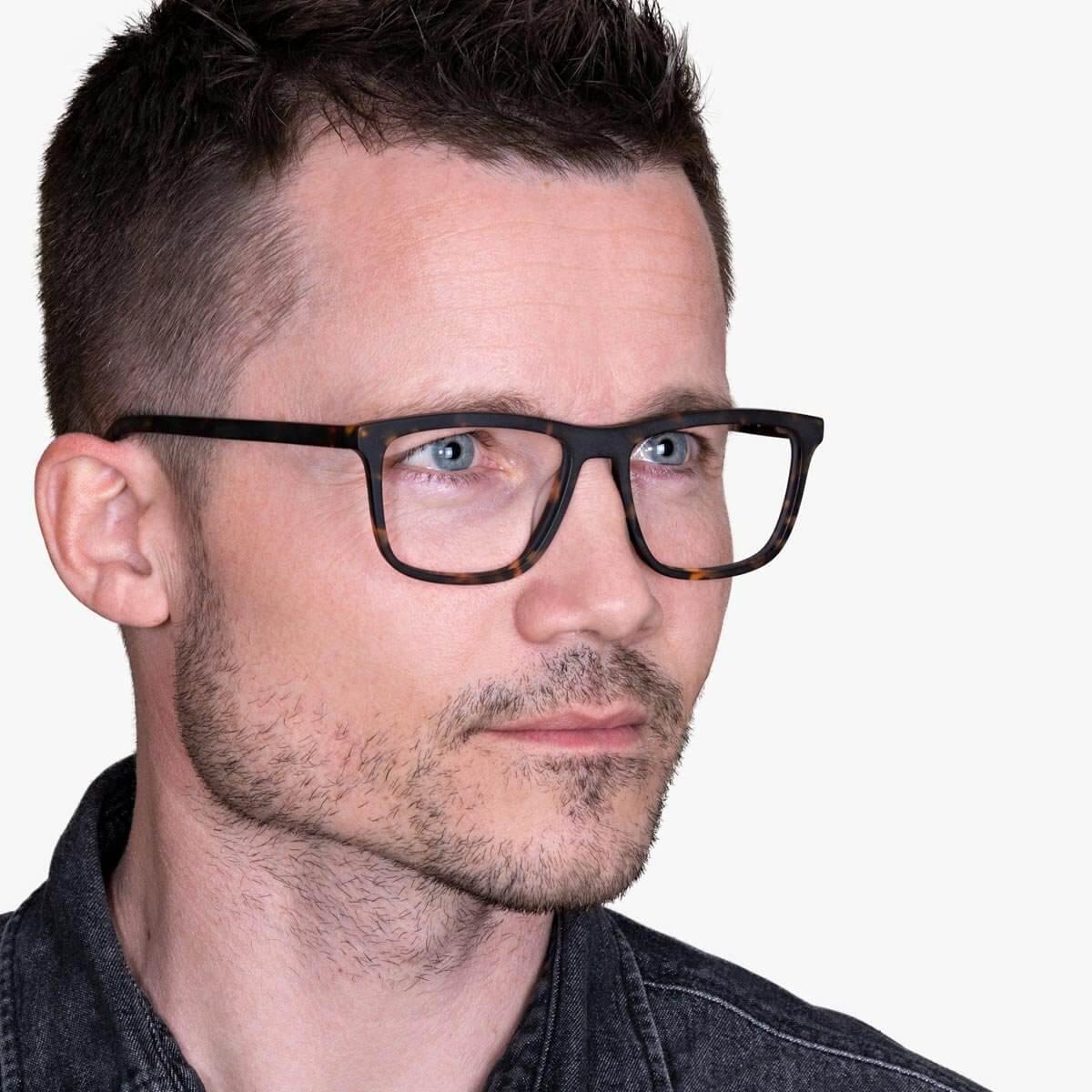 Person wearing Men's Oslo Dark Turtle eyeglasses