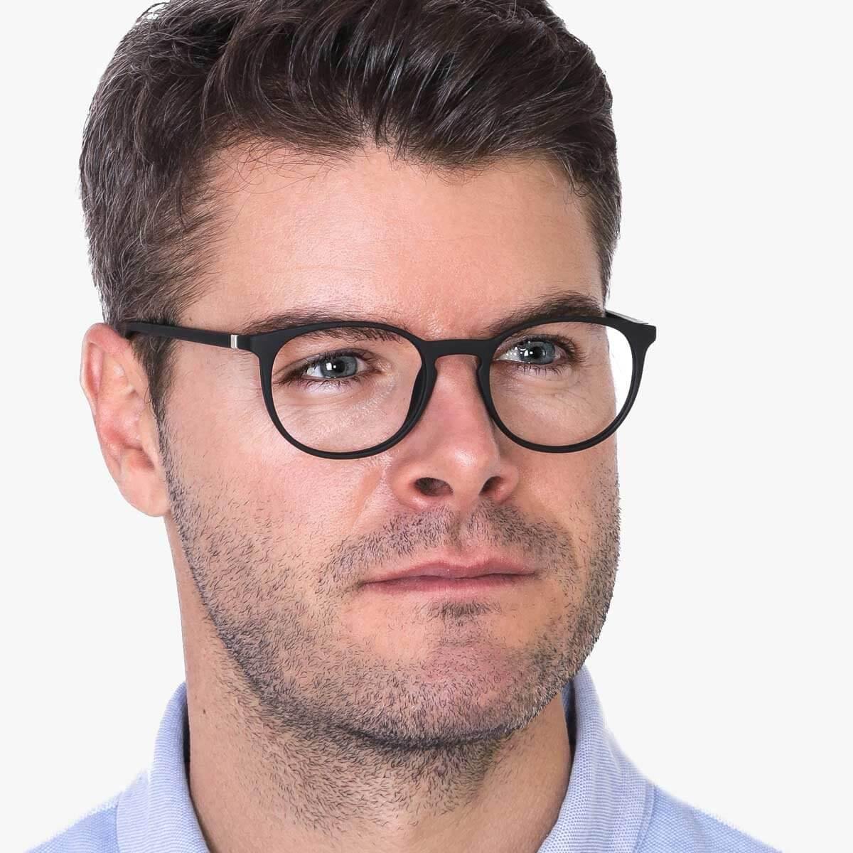 mens-stockholm-black_blue-light-glasses_male-model-1.jpg?v=1771426778&width=1200