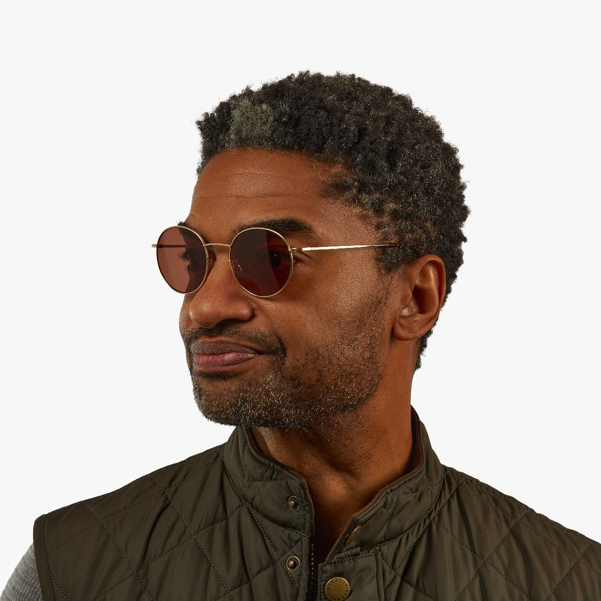 mens-tromso-gold_sunglasses_male-model-1.jpg?v=1771425151&width=1200