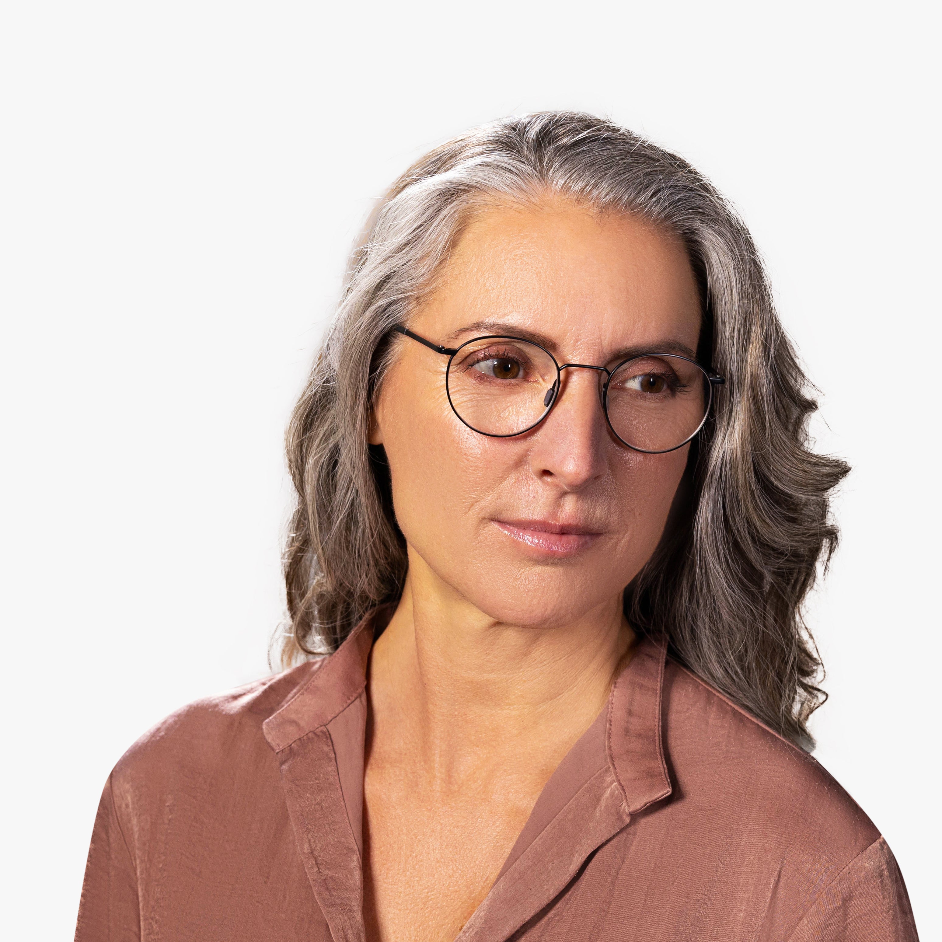 Person wearing Women's Silkeborg Black round glasses