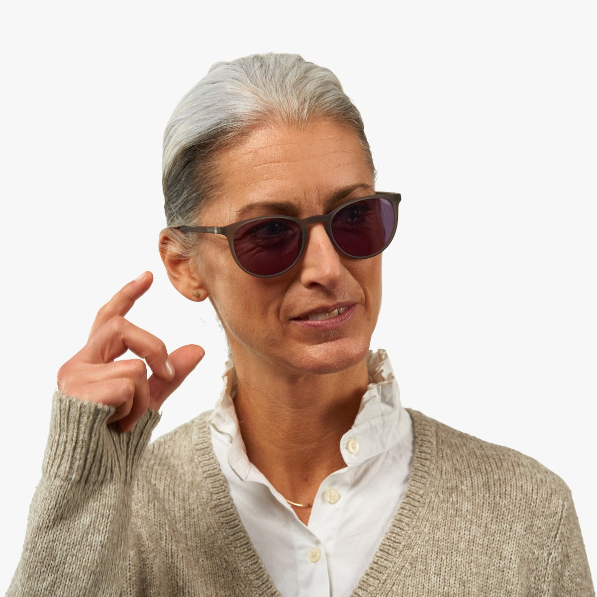 Person wearing Stockholm grey sunglasses